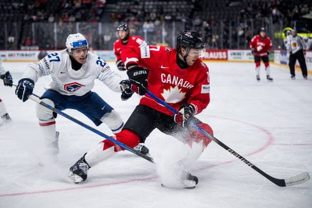 250513 Jules Boscq of France and Will Cuylle of Canada during the 2025 IIHF Ice Hockey World Championship group stage game between Canada and France on May 13, 2025 in Stockholm Photo Maxim Thore BILDBYRAN kod MT MT0814 ishockey ice hockey ishockey vm 2025 vm 2025 iihf world championship kanada canada frankrike france bbeng  Copyright: MAXIMxTHORE BB250513MT037
