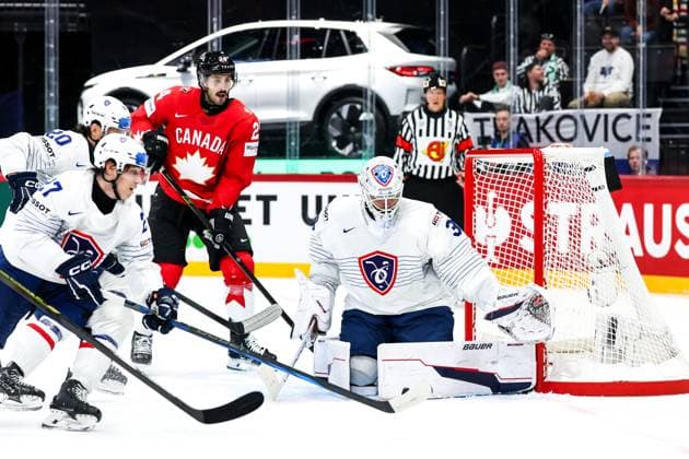 Ice hockey, Eishockey - IIHF WC 2025 STOCKHOLM,SWEDEN,13.MAY.25 - ICE HOCKEY - IIHF Ice Hockey World Championship, WM, Weltmeisterschaft 2025, group stage, Canada vs France. Image shows Jules Boscq (FRA), Phillip Danault (CAN) and Julian Junca (FRA).  GEPAxpictures xMaticxKlansek