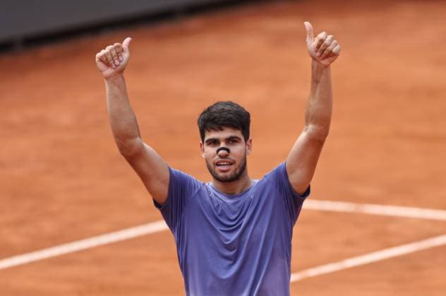 (250515) -- ROME, May 15, 2025 -- Carlos Alcaraz reacts after winning the men s singles quarterfinal match between Jack Draper of Britain and Carlos Alcaraz of Spain at the ATP, Tennis Herren Italian Open in Rome, Italy, May 14, 2025. ) (SP)ITALY-ROME-TENNIS-ATP-ITALIAN OPEN-JACK DRAPER VS CARLOS ALCARAZ LixJing 
