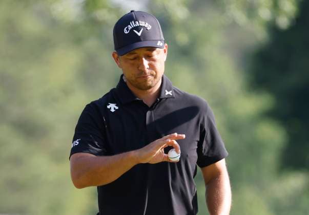 Xander Schauffele reacts after a putt on the 11th hole in the first round of the 2025 PGA, Golf Herren Championship at the Quail Hollow Club in Charlotte, North Carolina on Thursday, May 15, 2025.  CHA202405152050 TANNENxMAURY