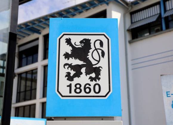 Football, Men, 3 Liga, Season 2024 2025, TSV 1860 Munich, Training, Grünwalder Strasse 114 Here the logo, coat of arms of TSV 1860 Munich on a stand at the training ground, symbolic image