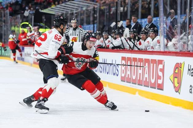 Ice hockey, Eishockey - IIHF WC 2025 STOCKHOLM,SWEDEN,15.MAY.25 - ICE HOCKEY - IIHF Ice Hockey World Championship, WM, Weltmeisterschaft 2025, group stage, Austria vs Canada. Image shows Brandon Montour (CAN) and Marco Kasper (AUT).  GEPAxpictures xMaticxKlansek