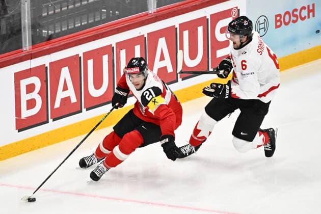 STOCKHOLM, SWEDEN 20250515 Austria s Lukas Haudum and Canada s Travis Sanheim during the IIHF Ice Hockey World Championship group A match between Canada and Austria at Avicii Arena in Stockholm, Sweden, on May 15, 2025 STOCKHOLM SWEDEN x10040x  Copyright: xAndersxWiklund TTx ICE HOCKEY WC CANADA-AUSTRIA