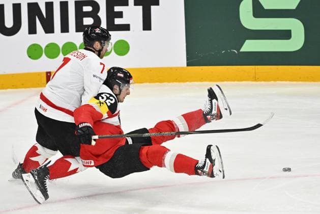 STOCKHOLM, SWEDEN 20250515 Canada s Mike Matheson and Austria s Paul Huber during the IIHF Ice Hockey World Championship group A match between Canada and Austria at Avicii Arena in Stockholm, Sweden, on May 15, 2025 STOCKHOLM SWEDEN x10040x  Copyright: xAndersxWiklund TTx ICE HOCKEY WC CANADA-AUSTRIA