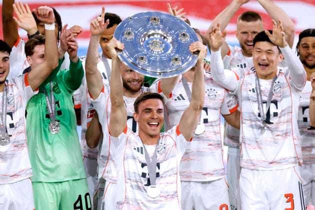 PALHINHA Joao Team FC Bayern Muenchen at the award ceremony with the championship trophy Football Bundesliga Season 2024 2025 German Champion 2025 FC Bayern Muenchen FC Bayern Muenchen Borussia Moenchengladbach on 10 05 2025 in Muenchen DFL REGULATIONS PROHIBIT ANY USE OF PHOTOGRAPHS as IMAGE SEQUENCES and or QUASI VIDEO Copyright: xLacixPerenyix