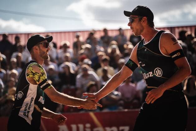Beach volleyball men Allianz German Beach Tour 2025 Tourstop Düsseldorf 16 05 2025 v l Clemens Wickler and Nils Ehlers cheer and smash Düsseldorf Robert Lehr Ufer North Rhine-Westphalia Germany