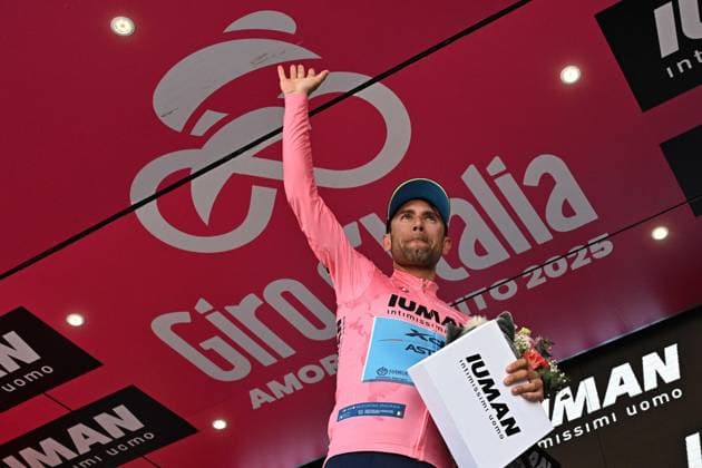 May 17, 2025, Castelraimondo, ITALY: Italian rider Diego Ulissi of Xds Astana Team wearing the overall leader s pink jersey, poses on the podium after the 8th stage of the 108 Giro d Italia 2025, cycling race over 197 km from Giulianova to Castelraimondo, Italy, 17 May 2025. ANSA LUCA ZENNARO. Giro D Italia Cycling Tour - Stage 8  - ZUMAa110 20250517_zaf_a110_091 Copyright: xLucaxZennarox