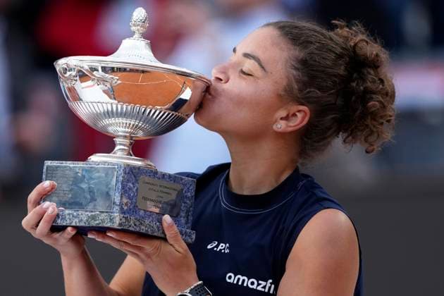 Jasmine Paolini of Italy kisses the trophy as she celebrates after winning the final of the Internazionali BNL d Italia 2025 tennis tournament against Coco Gauff of United States of America at Foro Italico in Rome, Italy on May 17, 2025. Jasmine Paolini won 6-4, 6-2. AntoniettaxBaldassarre