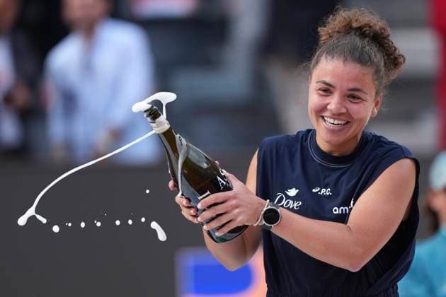 Jasmine Paolini of Italy sprays sparkling wine as she celebrates after winning the final of the Internazionali BNL d Italia 2025 tennis tournament against Coco Gauff of United States of America at Foro Italico in Rome, Italy on May 17, 2025. Jasmine Paolini won 6-4, 6-2. AntoniettaxBaldassarre