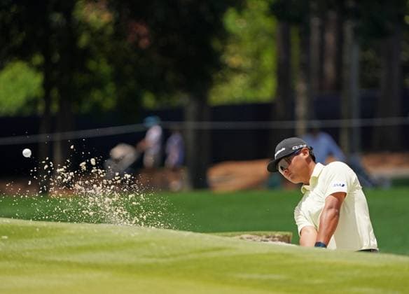 Golf: PGA, Golf Herren Championship Ryo Hisatsune of Japan hits out of a bunker on the fourth hole during the third round of the PGA Championship golf tournament at Quail Hollow Club in Charlotte, North Carolina, on May 17, 2025.  A14AA0004562746P
