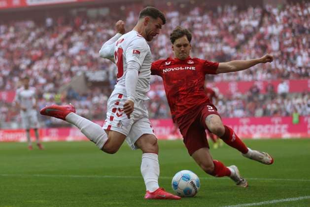 Jan Thielmann 1 FC Koeln and Florian Kleinhansl 1 FC Kaiserslautern battle for the ball during the 2 Bundesliga match between 1 FC Köln and 1 FC Kaiserslautern at RheinEnergieStadion on May 18, 2025 in Cologne, Germany, Germany Photo by Oliver Kaelke DeFodi Images Jan Thielmann 1 FC Koeln and Florian Kleinhansl 1 FC Kaiserslautern battle for the ball during the 2 Bundesliga match between 1 FC Köln and 1 FC Kaiserslautern at RheinEnergieStadion on May 18, 2025 in Cologne, Germany Photo by Oliver Kaelke DeFodi Images DFB DFL REGULATIONS PROHIBIT ANY USE OF PHOTOGRAPHS AS IMAGE SEQUENCES AND OR QUASI VIDEO Photo by Oliver Kaelke DeFodi Images