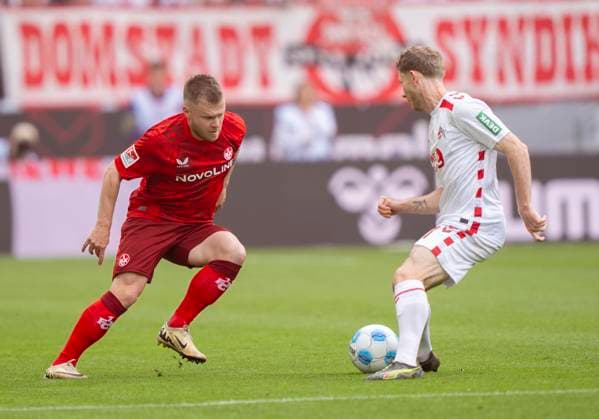 duel between Jean Zimmer 1 FC Kaiserslautern, 8 and Florian Kainz 1 FC Koeln, 11 18 05 2025, 1 FC Köln 1 FC Kaiserslautern Fussball, 2 Bundesliga, RheinEnergieStadion Köln DFL regulations prohibit any use of photographs as image sequences and or quasi video Copyright: HMBxMedia xMarcoxBader