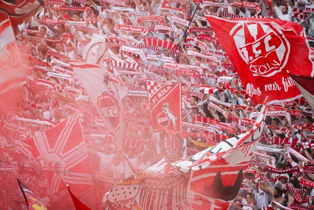 Soccer 2 Bundesliga, 1 FC Köln 1 FC Kaiserslautern, Matchday 34, RheinEnergieStadion Fans of 1 FC Köln wave their scarves and flags to the club anthem
