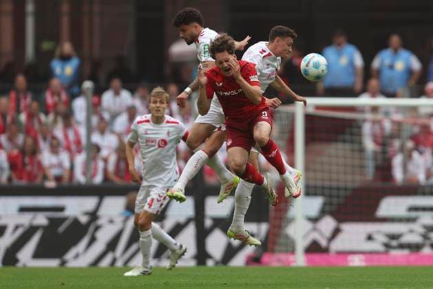 Jusuf Gazibegovic 1 FC Koeln , Florian Kleinhansl 1 FC Kaiserslautern and Eric Martel 1 FC Koeln battle for the ball during the 2 Bundesliga match between 1 FC Köln and 1 FC Kaiserslautern at RheinEnergieStadion on May 18, 2025 in Cologne, Germany Photo by Oliver Kaelke DeFodi Images Jusuf Gazibegovic 1 FC Koeln , Florian Kleinhansl 1 FC Kaiserslautern and Eric Martel 1 FC Koeln battle for the ball during the 2 Bundesliga match between 1 FC Köln and 1 FC Kaiserslautern at RheinEnergieStadion on May 18, 2025 in Cologne, Germany Photo by Oliver Kaelke DeFodi Images DFB DFL REGULATIONS PROHIBIT ANY USE OF PHOTOGRAPHS AS IMAGE SEQUENCES AND OR QUASI VIDEO Photo by Oliver Kaelke DeFodi Images