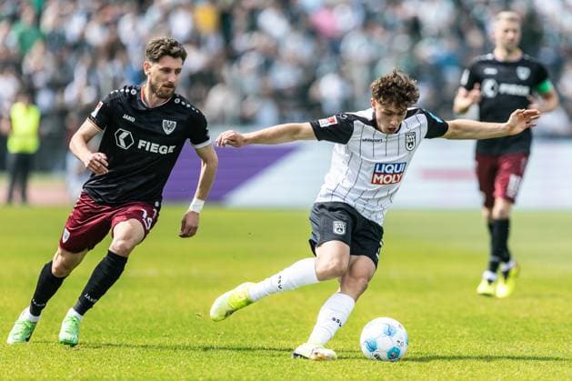 Soccer Men 2 Bundesliga 34 Matchday Season 2024 2025 SSV Ulm 1846 Football vs SC Preußen Münster 18 05 2025 18 05 2025, Football, Season 2024 2025, 2 Bundesliga, 34 Matchday, SSV Ulm 1846 Football vs SC Preußen Münster, v l 14 Charalambos Makridis SC Preußen Münster , 30 Maurice Krattenmacher SSV Ulm 1846 Football Photo Lucca Fundel DFL regulations prohibit any use of photographs as image sequences and or quasi video Ulm Donaustadion Baden Württemberg Germany