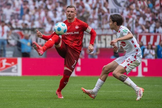 Acceptance by Marlon Ritter 1 FC Kaiserslautern, 07 covered by Denis Huseinbasic 1 FC Koeln, 08 1 FC Koeln vs 1 FC Kaiserslautern, Football, 2 Bundesliga, Matchday 34, Season 2024 2025, 18 05 2025 DFL REGULATES PROHIBIT ANY USE OF PHOTOGRAPHS AS IMAGE SEQUENCES AND OR QUASI VIDEO 1 FC Koeln vs 1 FC Kaiserslautern, Football, Bundesliga 2, Matchday 34, Season 2024 2025, 18 05 2025 Koeln Copyright: xEibner-Pressefoto JustinxDerondex EP_JDU