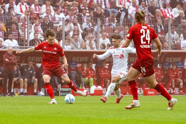 18 05 2025, Soccer 2 Bundesliga, Season 2024 2025, Matchday 34, 1 FC Koeln 1 FC Kaiserslautern at RheinEnergieStadion in Koeln duel between Florian Kleinhansl 1 FC Kaiserslautern, 03 and Jan Thielmann 1 FC Koeln, 29 Important note In accordance with the regulations of the DFL German Football League and the DFB German Football Association, it is prohibited to utilize or have utilized photographs taken in the stadium or of the match in the form of sequential images or video-like photo series Foto Kirchner Media Thomas Haesler Copyright: xKirchner-Media ThomasxHaeslerx