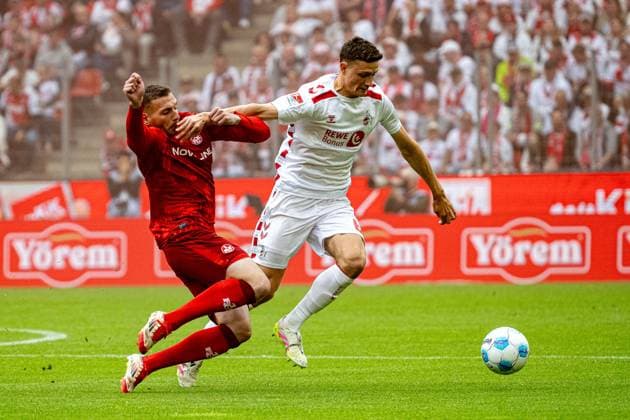 18 05 2025, Soccer 2 Bundesliga, Season 2024 2025, Matchday 34, 1 FC Koeln 1 FC Kaiserslautern at RheinEnergieStadion in Koeln duel between Luca Sirch 1 FC Kaiserslautern, 31 and Eric Martel 1 FC Koeln, 06 Important note In accordance with the regulations of the DFL German Football League and the DFB German Football Association, it is prohibited to utilize or have utilized photographs taken in the stadium or of the match in the form of sequential images or video-like photo series Foto Kirchner Media Thomas Haesler Copyright: xKirchner-Media ThomasxHaeslerx