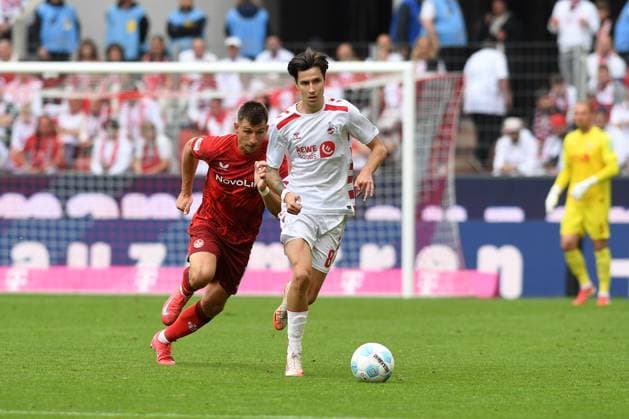 Denis Huseinbasic 1 FC Koeln in action, on the ball, individual action during the 2 Bundesliga match between 1 FC Köln and 1 FC Kaiserslautern at RheinEnergieStadion on May 18, 2025 in Cologne, Germany Photo by Ralf Treese DeFodi Images Denis Huseinbasic 1 FC Koeln controls the ball during the 2 Bundesliga match between 1 FC Köln and 1 FC Kaiserslautern at RheinEnergieStadion on May 18, 2025 in Cologne, Germany Photo by Ralf Treese DeFodi Images DFB DFL REGULATIONS PROHIBIT ANY USE OF PHOTOGRAPHS AS IMAGE SEQUENCES AND OR QUASI VIDEO Photo by Ralf Treese DeFodi Images