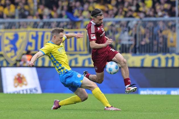 18 05 2025 Soccer Season 2024 2025 2 Soccer Bundesliga 34 Matchday Eintracht Braunschweig BTSV EBS 1 FC Nürnberg FCN Club Sportfoto Zink DaMa xdaxmax DFL regulations prohibit any use of photographs as image sequences and or quasi video only for editorial use Paul Jaeckel 3, Eintracht Braunschweig BTSV EBS Berkay Yilmaz 21, 1 FC Nürnberg FCN