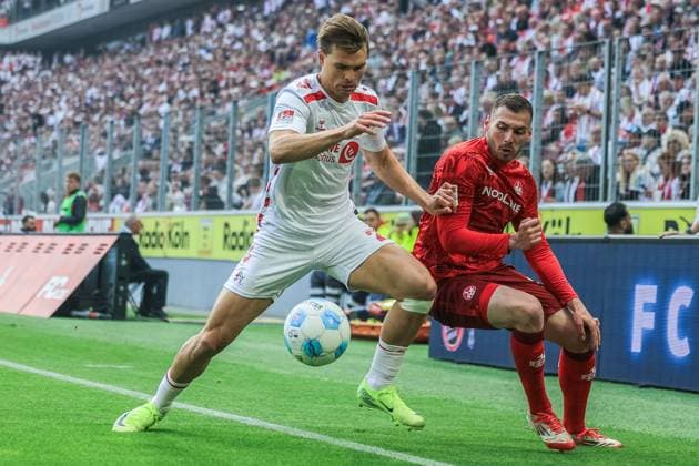 Soccer 2 Bundesliga 34 Matchday 1 FC Köln 1 FC Kaiserslautern on 18 05 2025 at RheinEnergieStadion in Cologne Jusuf Gazibegovic Köln , left Leon Robinson Kaiserslautern , right DFL regulations prohibit any use of photographs as image sequences and or quasi video xJRx