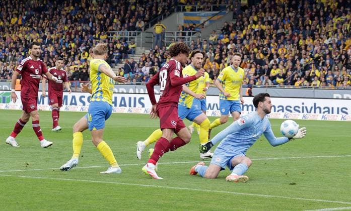 Goalkeeper Marko Johansson Eintracht Braunschweig saves Football, Men, Season 2024 2025 2 BL, Eintracht Stadion, Eintracht Braunschweig vs 1 FC Nuernberg DFL REGULATIONS PROHIBIT ANY USE OF PHOTOGRAPHS AS IMAGE SEQUENCES AND OR QUASI VIDEO