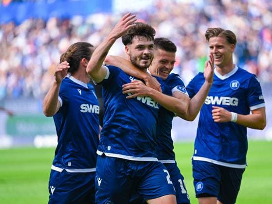 Lilian Egloff Karlsruher SC celebrates his goal with Marvin Wanitzek Karlsruher SC and Dzenis Burnic Karlsruher SC during the 2 Bundesliga match between Karlsruher SC and SC Paderborn at BBBank Wildpark on May 18, 2025 in Karlsruhe, Germany, Germany Photo by Silas Schüller DeFodi Images Lilian Egloff Karlsruher SC celebrates his goal with Marvin Wanitzek Karlsruher SC and Dzenis Burnic Karlsruher SC during the 2 Bundesliga match between Karlsruher SC and SC Paderborn at BBBank Wildpark on May 18, 2025 in Karlsruhe, Germany Photo by Silas Schüller DeFodi Images DFB DFL REGULATIONS PROHIBIT ANY USE OF PHOTOGRAPHS AS IMAGE SEQUENCES AND OR QUASI VIDEO Photo by Silas Schueller DeFodi Images
