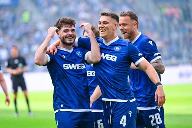 Lilian Egloff Karlsruher SC celebrates his goal with Marcel Beifus Karlsruher SC and Marcel Franke Karlsruher SC during the 2 Bundesliga match between Karlsruher SC and SC Paderborn at BBBank Wildpark on May 18, 2025 in Karlsruhe, Germany, Germany Photo by Silas Schüller DeFodi Images Lilian Egloff Karlsruher SC celebrates his goal with Marcel Beifus Karlsruher SC and Marcel Franke Karlsruher SC during the 2 Bundesliga match between Karlsruher SC and SC Paderborn at BBBank Wildpark on May 18, 2025 in Karlsruhe, Germany Photo by Silas Schüller DeFodi Images DFB DFL REGULATIONS PROHIBIT ANY USE OF PHOTOGRAPHS AS IMAGE SEQUENCES AND OR QUASI VIDEO Photo by Silas Schueller DeFodi Images