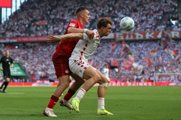 Filip Kaloc 1 FC Kaiserslautern and Joel Schmied 1 FC Koeln battle for the ball during the 2 Bundesliga match between 1 FC Köln and 1 FC Kaiserslautern at RheinEnergieStadion on May 18, 2025 in Cologne, Germany, Germany Photo by Oliver Kaelke DeFodi Images Filip Kaloc 1 FC Kaiserslautern and Joel Schmied 1 FC Koeln battle for the ball during the 2 Bundesliga match between 1 FC Köln and 1 FC Kaiserslautern at RheinEnergieStadion on May 18, 2025 in Cologne, Germany Photo by Oliver Kaelke DeFodi Images DFB DFL REGULATIONS PROHIBIT ANY USE OF PHOTOGRAPHS AS IMAGE SEQUENCES AND OR QUASI VIDEO Photo by Oliver Kaelke DeFodi Images