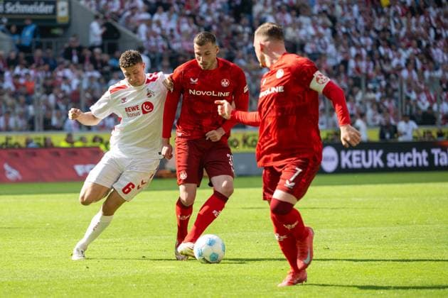 18 05 2025, Soccer 2 Bundesliga, Season 2024 2025, Matchday 34, 1 FC Koeln 1 FC Kaiserslautern in the RheinEnergieStadion in Koeln duel between Eric Martel 1 FC Koeln, 06 and Luca Sirch 1 FC Kaiserslautern, 31 Important note In accordance with the regulations of the DFL German Football League and the DFB German Football Association, it is prohibited to utilize or have utilized photographs taken in the stadium and or of the match in the form of sequential images and or video-like photo series Foto Kirchner Media Thomas Haesler Copyright: xKirchner-Media ThomasxHaeslerx