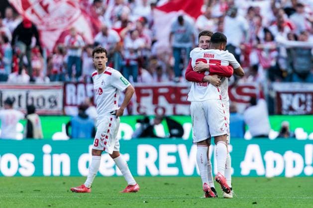 2 Soccer Bundesliga, 1 FC Köln 1 FC Kaiserslautern, 18 05 2025 Florian Kainz 1 FC Köln, 11 Dominique Heintz 1 FC Köln, 3 and Linton Maina 1 FC Köln, 37 hug each other 2 Soccer Bundesliga, 1 FC Köln 1 FC Kaiserslautern, Cologne, RheinEnergiestadion on 18 05 2025 DFL REGULATES PROHIBIT ANY USE OF PHOTOGRAPHS AS IMAGE SEQUENCES AND OR QUASI VIDEO Copyright: xBEAUTIFULxSPORTS Wunderlx