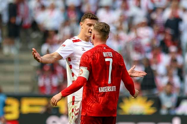 Cologne, Germany, 18 05 25 Eric Martel 1 FC Köln and Marlon Ritter 1 FC Kaiserslautern stand face to face during the Bundesliga 2 match between 1 FC Köln and 1 FC Kaiserslautern at RheinEnergieStadion Cologne RheinEnergieStadion North Rhine Westphalia Germany Copyright: xBrauer-Fotoagenturx xAdrianxSchlx