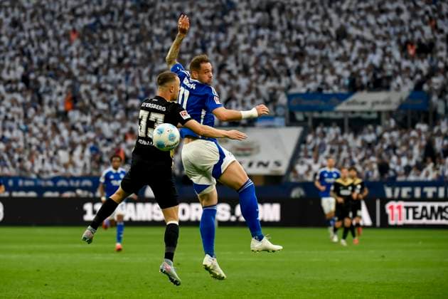 Pierre Michel Lasogga FC Schalke 04 and Maurice Neubauer SV 07 Elversberg battle for the ball during the Second Bundesliga match between FC Schalke 04 and SV 07 Elversberg, Veltins Arena on May 18, 2025 in Gelsenkirchen, Germany, Germany Photo by Max Maiwald DeFodi Images Pierre Michel Lasogga FC Schalke 04 and Maurice Neubauer SV 07 Elversberg battle for the ball during the Second Bundesliga match between FC Schalke 04 and SV 07 Elversberg at Veltins Arena on May 18, 2025 in Gelsenkirchen Germany Photo by Max Maiwald DeFodi Images DFL regulations prohibit any use of photographs as image sequences and or quasi video Photo by Max Maiwald DeFodi Images