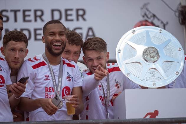 18 05 2025, Soccer 2 Bundesliga, Season 2024 2025, Matchday 34, 1 FC Koeln 1 FC Kaiserslautern at RheinEnergieStadion in Koeln Florian Kainz 1 FC Koeln, 11 , Linton Maina 1 FC Koeln, 37 , Luca Waldschmidt 1 FC Koeln, 09 and Jan Thielmann 1 FC Koeln, 29 celebrate the title next to the championship trophy, Important note In accordance with the regulations of the DFL German Football League and the DFB German Football Association, it is prohibited to use or have used photographs taken in the stadium or of the match in the form of sequential images or video-like photo series Foto Kirchner Media Thomas Haesler Copyright: xKirchner-Media ThomasxHaeslerx