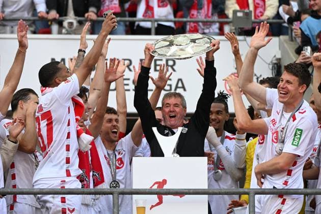 Coach Friedhelm Funkel 1 FC Koeln with the championship trophy of second Bundesliga during the 2 Bundesliga match between 1 FC Köln and 1 FC Kaiserslautern at RheinEnergieStadion on May 18, 2025 in Cologne, Germany Photo by Ralf Treese DeFodi Images Coach Friedhelm Funkel 1 FC Koeln the championship trophy of second Bundesliga during the 2 Bundesliga match between 1 FC Köln and 1 FC Kaiserslautern at RheinEnergieStadion on May 18, 2025 in Cologne, Germany Photo by Ralf Treese DeFodi Images DFB DFL REGULATIONS PROHIBIT ANY USE OF PHOTOGRAPHS AS IMAGE SEQUENCES AND OR QUASI VIDEO Photo by Ralf Treese DeFodi Images