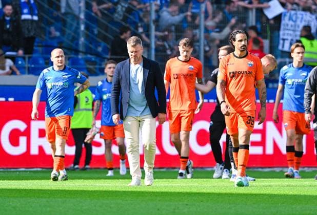 Coach Lukas Kwasniok SC Paderborn and Adriano Grimaldi SC Paderborn look sad after the 2 Bundesliga match between Karlsruher SC and SC Paderborn at BBBank Wildpark on May 18, 2025 in Karlsruhe, Germany, Germany Photo by Silas Schüller DeFodi Images Lukas Kwasniok SC Paderborn and Adriano Grimaldi SC Paderborn look sad after the 2 Bundesliga match between Karlsruher SC and SC Paderborn at BBBank Wildpark on May 18, 2025 in Karlsruhe, Germany Photo by Silas Schüller DeFodi Images DFB DFL REGULATIONS PROHIBIT ANY USE OF PHOTOGRAPHS AS IMAGE SEQUENCES AND OR QUASI VIDEO Photo by Silas Schueller DeFodi Images