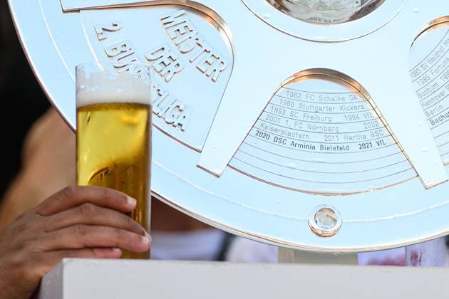 COLOGNE, GERMANY - 18 MAY, 2025: Beer, trophy - The final match of 2.Bundesliga 1.FC Koeln vs 1. FC Kaiserslautern at Rhein Energie Stadion.  Copyright: xVITALIIxKLIUIEVx