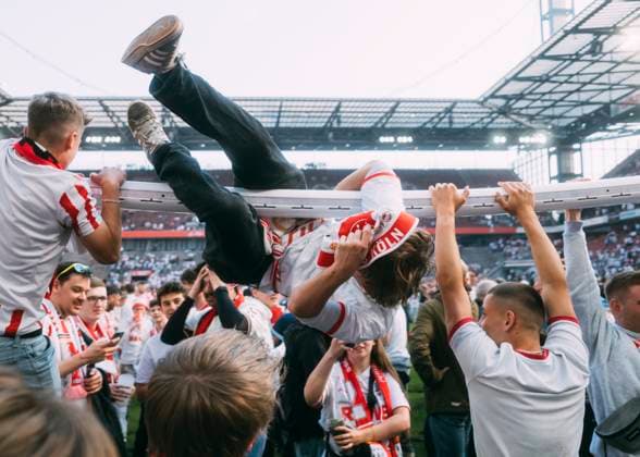 Köln, RheinEnergieStadion, 18 05 2025 Fans of 1 FC Koeln celebrate the win of the cup after the 2 Bundesliga match 1 FC Köln vs 1 FC Kaiserslautern