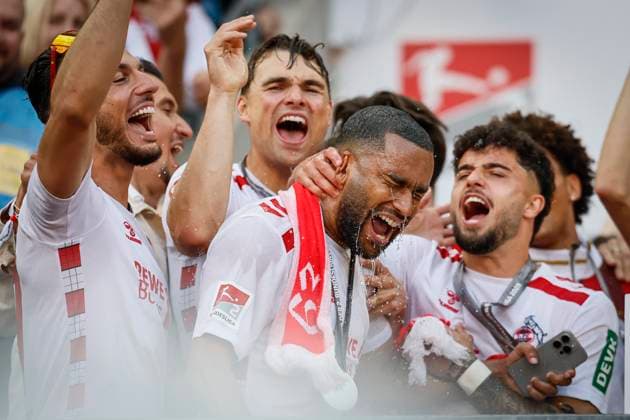 2 Soccer Bundesliga, 1 FC Köln 1 FC Kaiserslautern, 18 05 2025 Celebrate the second league championship title Jusuf Gazibegovic 1 FC Köln, 25 , Joel Schmied 1 FC Köln, 2 , Linton Maina 1 FC Köln, 37 , k25 34 Matchday of the 2 Soccer Bundesliga, 2 Fußball Bundesliga, 1 FC Köln 1 FC Kaiserslautern on 18 05 2025 at the RheinEnergie Stadium in Cologne THE DFL REGULATIONS PROHIBIT ANY USE OF PHOTOS AS PICTURE SEQUENCES AND OR QUASI VIDEO Copyright: xBEAUTIFULxSPORTS AxelxKohringx
