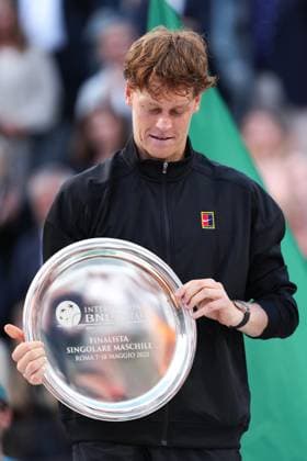 Jannik Sinner of Italy with the trophy of second place during the award ceremony after the men singles final match against Carlos Alcaraz of Spain at the Internazionali BNL d Italia 2025 tennis at Foro Italico in Rome, Italy on may 18, 2025. AntoniettaxBaldassarre
