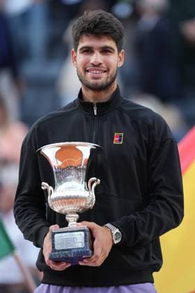 Carlos Alcaraz of Spain with the trophy during the award ceremony after the men singles final match against Jannik Sinner of Italy at the Internazionali BNL d Italia 2025 tennis at Foro Italico in Rome, Italy on may 18, 2025. AntoniettaxBaldassarre