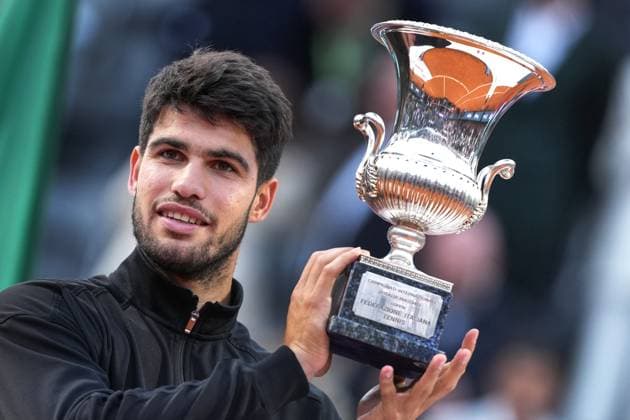 Carlos Alcaraz of Spain with the trophy during the award ceremony after the men singles final match against Jannik Sinner of Italy at the Internazionali BNL d Italia 2025 tennis at Foro Italico in Rome, Italy on may 18, 2025. AntoniettaxBaldassarre