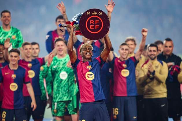 Lamine Yamal FC Barcelona celebrates the 2024 2025 La Liga EA Sports championship, the Spanish Supercopa and the Copa del Rey with the trophy during the LaLiga match between FC Barcelona and Villarreal CF at Olimpic Lluis Companys on May 18, 2025 in Barcelona, Spain Photo by Xavi Bonilla DeFodi Images