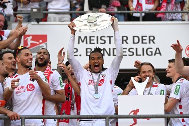 Damion Downs 1 FC Koeln with the championship trophy of second Bundesliga during the 2 Bundesliga match between 1 FC Köln and 1 FC Kaiserslautern at RheinEnergieStadion on May 18, 2025 in Cologne, Germany Photo by Ralf Treese DeFodi Images Damion Downs 1 FC Koeln with the championship trophy of second Bundesliga during the 2 Bundesliga match between 1 FC Köln and 1 FC Kaiserslautern at RheinEnergieStadion on May 18, 2025 in Cologne, Germany Photo by Ralf Treese DeFodi Images DFB DFL REGULATIONS PROHIBIT ANY USE OF PHOTOGRAPHS AS IMAGE SEQUENCES AND OR QUASI VIDEO Photo by Ralf Treese DeFodi Images