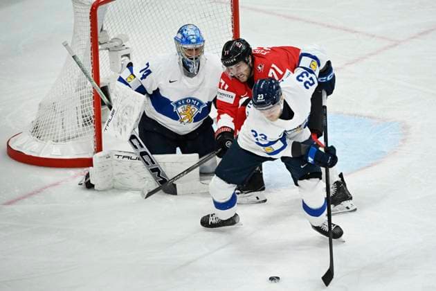 STOCKHOLM, SWEDEN 20250519 Canada s Tyson Foerster against Finland s Nikolas Matinpalo and Finland s Juuse Saros during the IIHF Ice Hockey World Championship group A match between Canada and Finland at Avicii Arena in Stockholm, Sweden, on May 19, 2025 STOCKHOLM SWEDEN x10080x  Copyright: xFredrikxSandberg TTx ICE HOCKEY WC CANADA-FINLAND