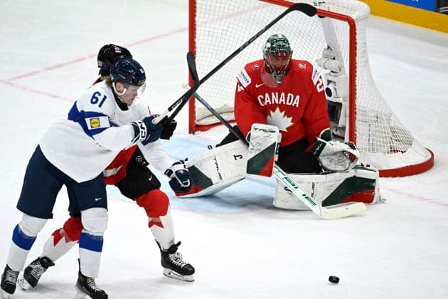 STOCKHOLM, SWEDEN 20250519 Finland s Juuso Parssinen and Canada s goalkeeper Marc Andre Fleury during the IIHF Ice Hockey World Championship group A match between Canada and Finland at Avicii Arena in Stockholm, Sweden, on May 19, 2025 STOCKHOLM SWEDEN x10080x  Copyright: xFredrikxSandberg TTx ICE HOCKEY WC CANADA-FINLAND