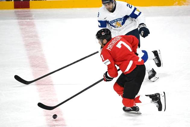 STOCKHOLM, SWEDEN 20250519 Canada s Mike Matheson and Finland s Ahti Oksanen during the IIHF Ice Hockey World Championship group A match between Canada and Finland at Avicii Arena in Stockholm, Sweden, on May 19, 2025 STOCKHOLM SWEDEN x10080x  Copyright: xFredrikxSandberg TTx ICE HOCKEY WC CANADA-FINLAND