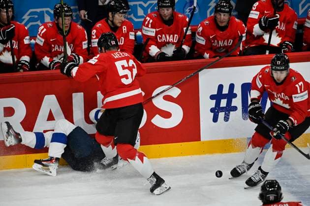 STOCKHOLM, SWEDEN 20250519 Canadas Mackenzie Weegar Canada tackles a Finnish player during the IIHF Ice Hockey World Championship group A match between Canada and Finland at Avicii Arena in Stockholm, Sweden, on May 19, 2025 Â¨ STOCKHOLM SWEDEN x10080x  Copyright: xFredrikxSandberg TTx ICE HOCKEY WC CANADA-FINLAND