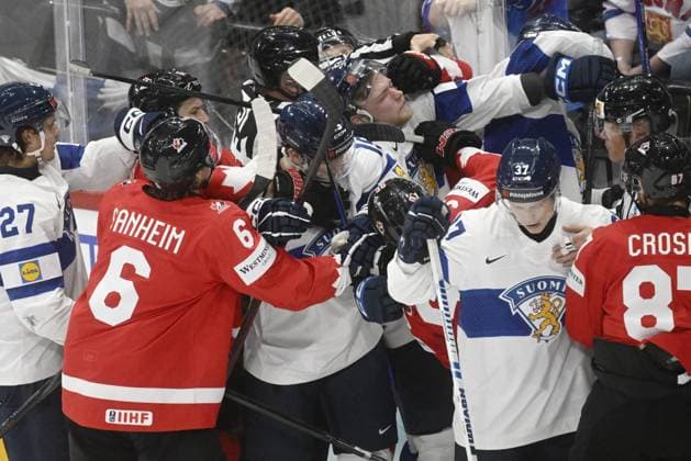 Players fight at the end of the second period during the 2025 IIHF Ice hockey, Eishockey World Championships preliminary round group A match between Canada and Finland in Stockholm on May 19, 2025. Stockholm Sweden LKFTJK20250519225108VDTO  Copyright: xVesaxMoilanenx LKFTJK20250519225108VDTO