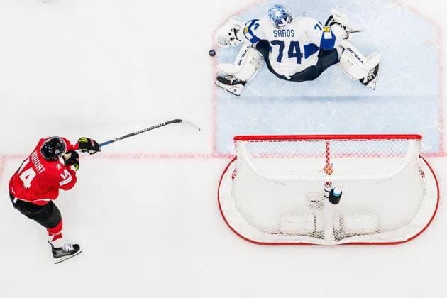 250519 Bo Horvat of Canada and goaltender Juuse Saros of Finland during the 2025 IIHF Ice Hockey World Championship group stage game between Canada and Finland on May 19, 2025 in Stockholm Photo Simon Hastegard BILDBYRAN kod SH SH0623 ishockey ice hockey ishockey vm 2025 vm 2025 iihf world championship kanada canada finland 10 bbeng  Copyright: SIMONxHASTEGARD BB250519SH023